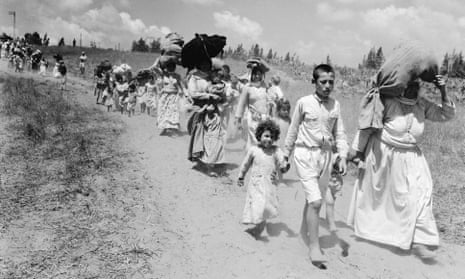 Palestinian refugees near Haifa in 1948.