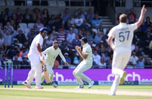Overton celebrates with Jonny Bairstow after catching Rishabh Pant.
