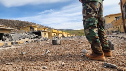 Damaged buildings after what the security sources say was a drone attack on an arms depot at the headquarters of an Iranian Kurdish opposition group on Wednesday.