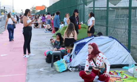 ‘The only thing between you and the artist is the barricade’ … Fans queuing for a Harry Styles concert in Rio de Janeiro, Brazil, December 2022.