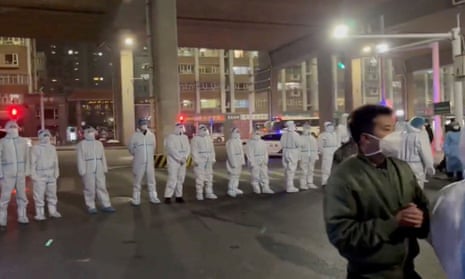 Crowds in Urumqi shouted ‘End the lockdown’ at hazmat-suited guards