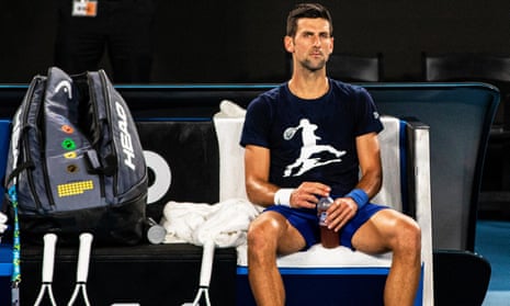 Novak Djokovic's visa re-cancelled<br>epa09684505 Novak Djokovic of Serbia rests during a practice session ahead of the Australian Open Grand Slam tennis tournament at Melbourne Park in Melbourne, Australia, 14 January 2022. The Australian federal government has re-cancelled Novak Djokovic's visa.  EPA/DIEGO FEDELE  AUSTRALIA AND NEW ZEALAND OUT