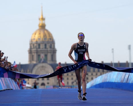 Cassandre Beaugrand of France crosses the line to win the gold medal in 2024.