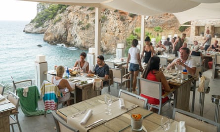 Amante Beach Club restaurant, directly overlooking the sea and cliffs.