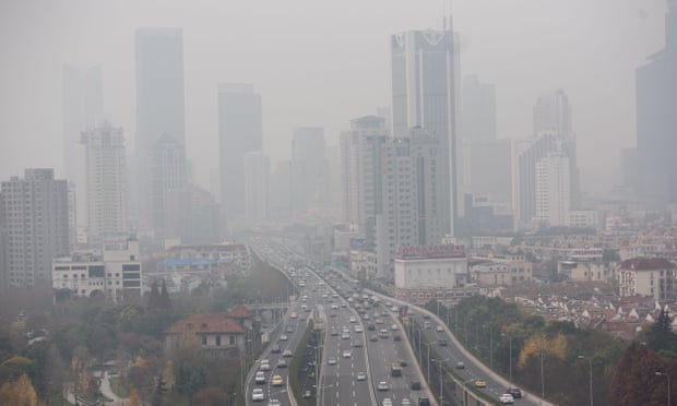 Heavy pollution hangs over elevated motorways in Shanghai.