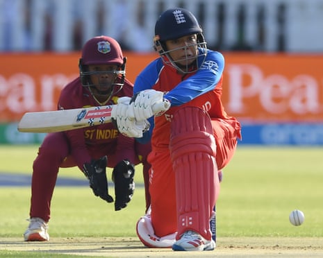 Sophia Dunkley of England hits out watched by Shemaine Campbelle.