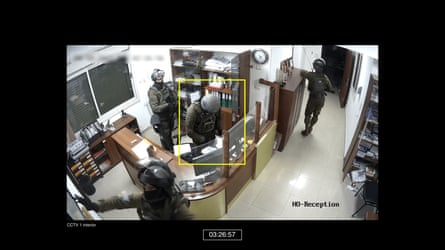 people raiding a building