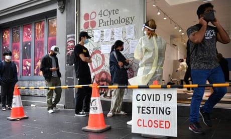 People queue at a Covid testing site at in Melbourne
