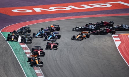 Lando Norris leads at the opening corner