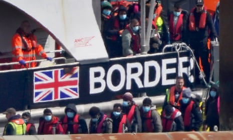People disembark at Dover, Kent, from a Border Force vessel after a small boat incident in the Channel