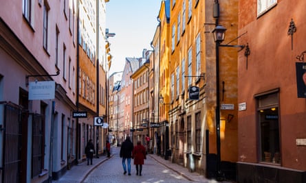 People walking in the narrow streets in Stockholm’s old town, Gamla Stan.