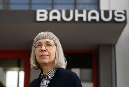 Barbara Steiner in front of a Bauhaus sign on a building.