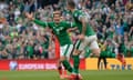 Ireland’s Shane Duffy celebrates scoring their first goal with Callum Robinson.