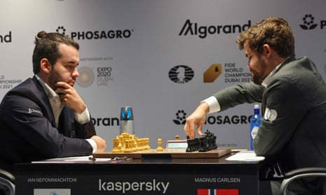 Magnus Carlsen defends his world chess title, beating Ian