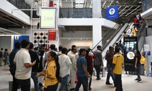Customers enter at the new IKEA store.