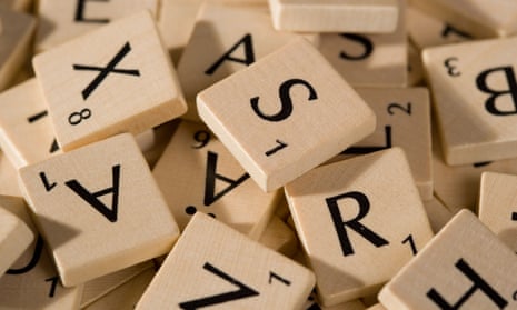 Scrabble pieces with different letters.