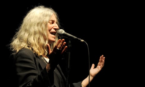 Patti Smith, ‘now unfeasibly lithe, bovver-booted’, performs at the Manchester Apollo on Tuesday.