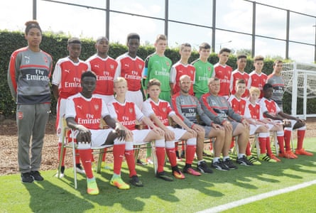 Bukayo Saka (front row, left) alongside his Arsenal under-15 teammates and coach Fredrik Ljungberg (front row, centre) in September 2016