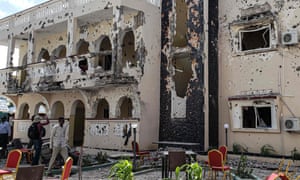 The scene of a suicide bombing and shooting at a hotel in Kismayo, Somalia