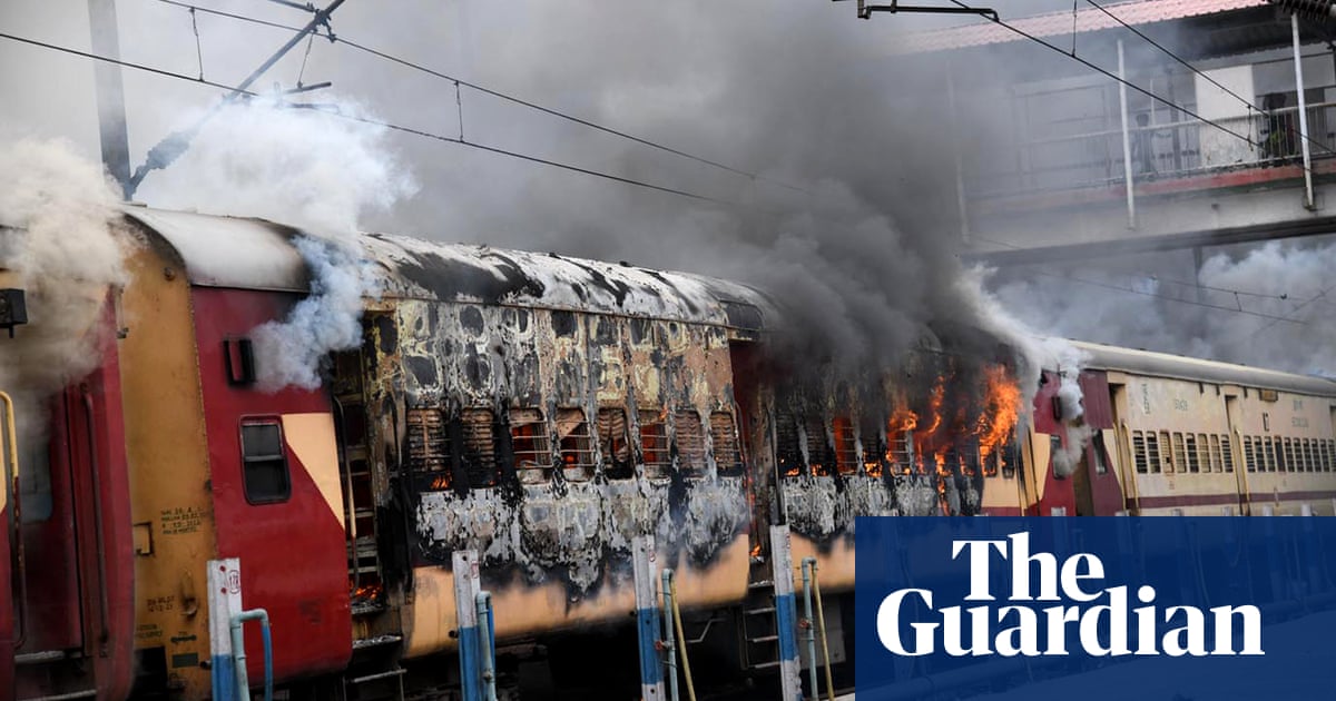 Indian railway stations on fire as protests against military hiring plan intensify – video