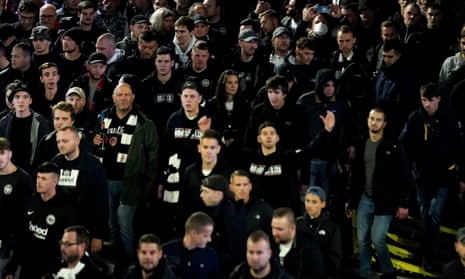 Eintracht Frankfurt fans make their way towards the Tottenham Hotspur Stadium.