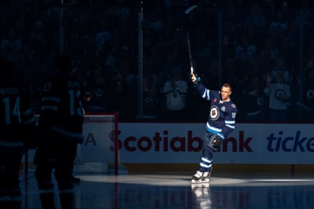Jonathan Toews is introduced in his first game for the Winnipeg Jets in October.