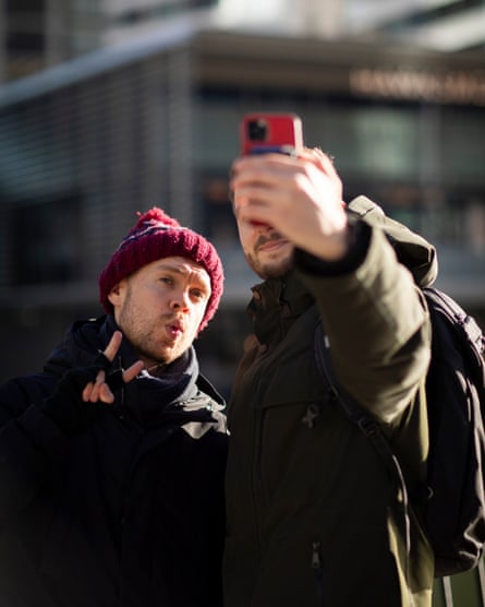 A fan asks Stevenson for a selfie in Canary Wharf, London.