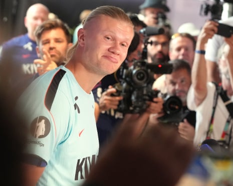 The Norway striker Erling Haaland makes an amused facial expression while addressing the media before his team play England in the World Cup quarter-finals.