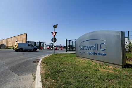 A general view of the construction site entrance to Sizewell C and its sign