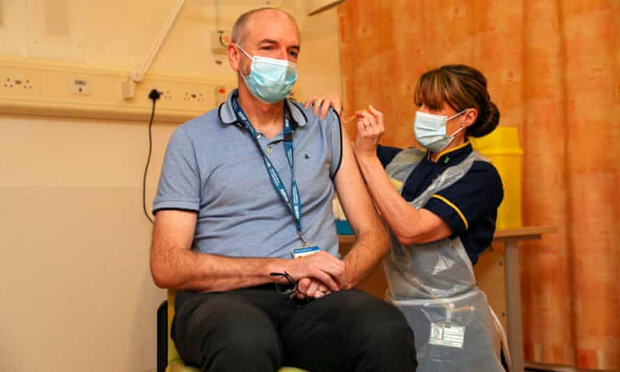 Professor Andrew Pollard, Director of the Oxford Vaccine Group, receives a dose of the vaccine he developed, last month.