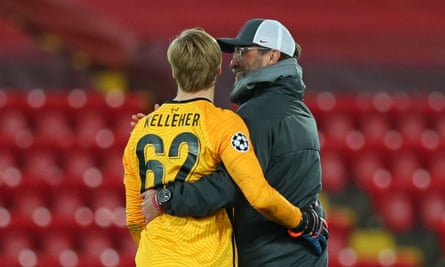 Jürgen Klopp gives Caoimhin Kelleher a hug at the end of the game.