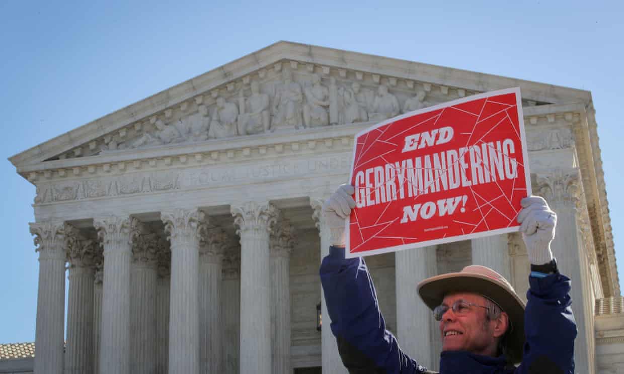 <div class=__reading__mode__extracted__imagecaption>A protester at a ‘fair maps’ rally in March 2019. The justices ruled 6-3 on Monday not to block the new North Carolina maps from going into effect. Photograph: Brendan McDermid/Reuters<br>A protester at a ‘fair maps’ rally in March 2019. The justices ruled 6-3 on Monday not to block the new North Carolina maps from going into effect. Photograph: Brendan McDermid/Reuters</div>