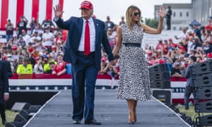 Donald Trump walks with Melania Trump in Tampa in October.