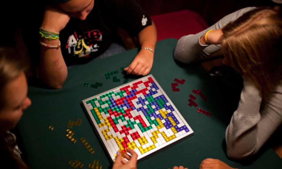 Children playing a game of Blokus
