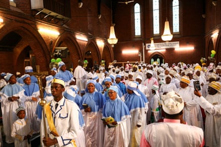 Members sing as they celebrate their annual Thanksgiving in Elephant and Castle