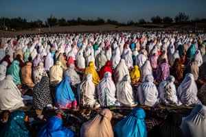 Muslims perform Eid al-Fitr prayers at Parangkusumo beach