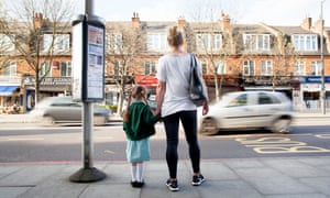 Parent and child near road