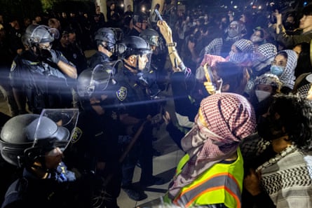 police face off against protesters