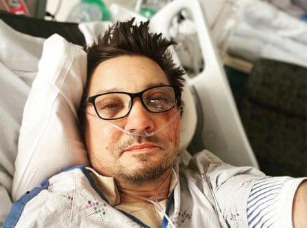 Renner posts a selfie from his hospital bed days after his accident in January 2023.