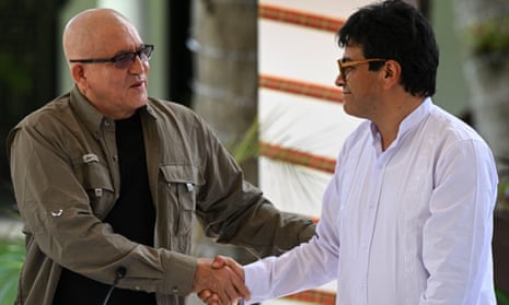 The first commander of the Colombian National Liberation Army (ELN), Antonio Garcia (left), and the Colombian government's commissioner for peace, Danilo Rueda