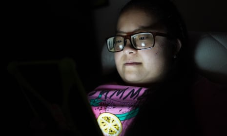 Person with Down's syndrome looks at laptop screen
