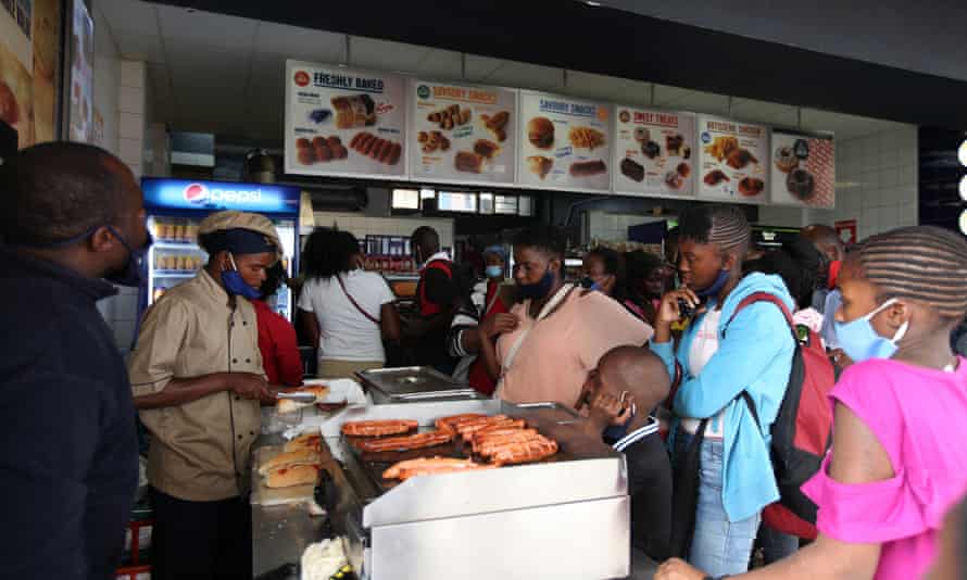 A packed Harare fast food store on New Year’s Eve.