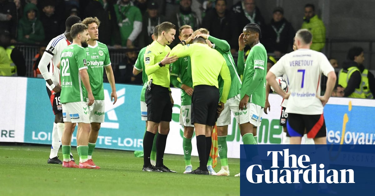 Fan arrested after assistant referee hit on head with object at St-Etienne