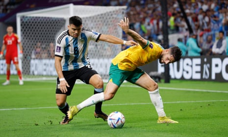 Marcos Acuña of Argentina is fouled by Mathew Leckie of Australia.