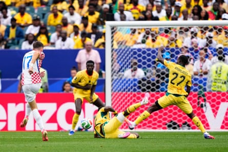 Croatia’s Petar Sucic sends his first-half effort whistling successful to nan bottommost corner