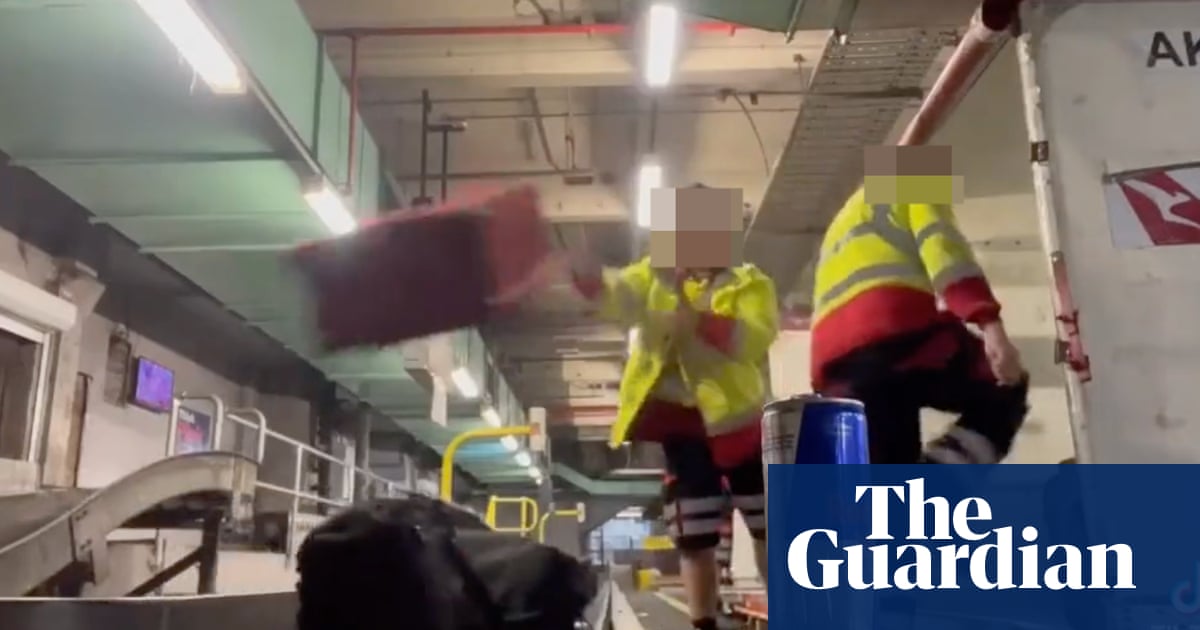Baggage handlers filmed slamming luggage onto conveyor belt at Melbourne airport..