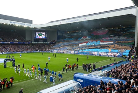 Rangers fan display a tifo as the players take to the pitch during the Scottish Premiership match against Celtic at Ibrox Stadium.