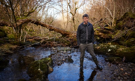 Author and senior site manager Lee Schofield in the woods above Naddle farm.