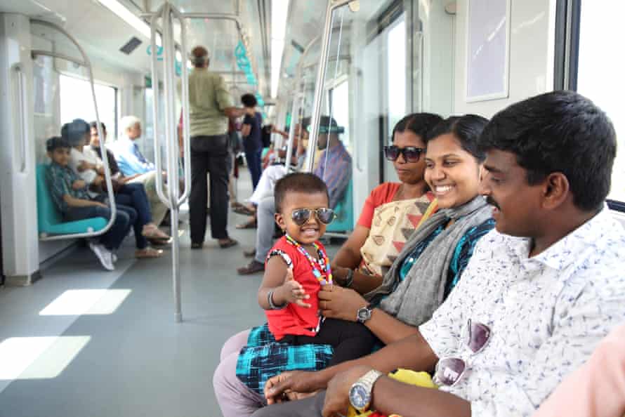 Passengers on board a Kothi Metro train