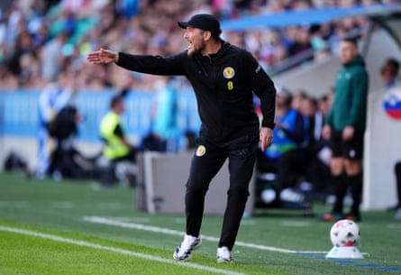 Sébastien Pocognoli points from the touchline.